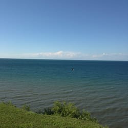 The Cliffs at Sodus Point - Bald eagle flying around (look real hard). Appeared much closer in person.