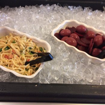 Black Dog Pub - two bowls of spaghetti and grapes - Salad Near Me Black Dog Pub - two bowls of spaghetti and grapes - Salad Near Me