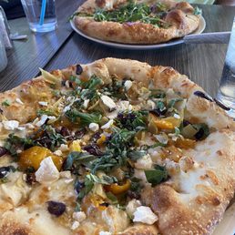 Hot Honey, Fig and Salami Pizza in back Puttanesca Pizza in front