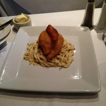 Herbsaint - Spaghetti with guan isle and fried poached farm egg. The waiter told us this was kind of their signature dish. - French Near Me - New Orleans, Louisiana Herbsaint - Spaghetti with guan isle and fried poached farm egg. The waiter told us this was kind of their signature dish. - French Near Me - New Orleans, Louisiana