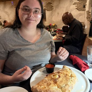 Rustico - My daughter with her ham & pineapple calzone - Italian Near Me - Murrieta, California