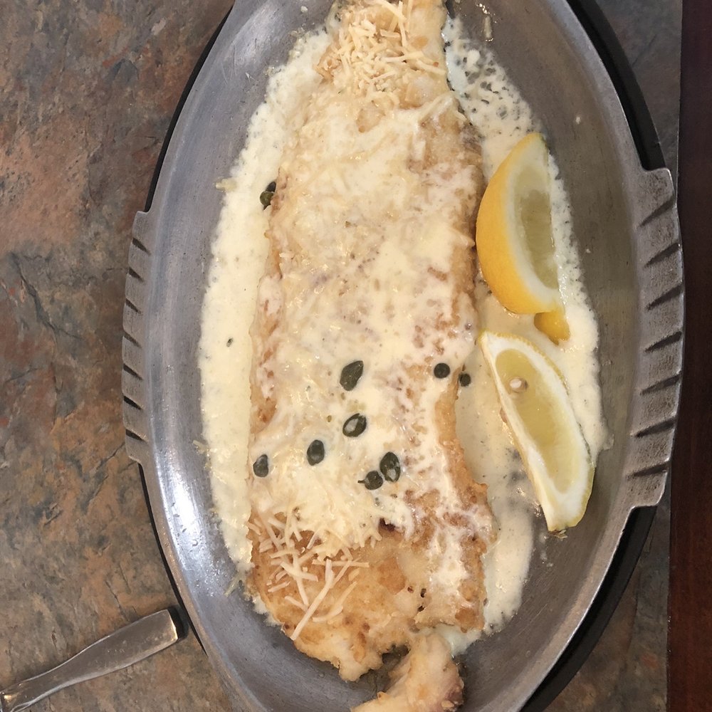 Scotty's - a fish fillet in a skillet - Seafood Near Me - Ludington, Michigan Scotty's - a fish fillet in a skillet - Seafood Near Me - Ludington, Michigan