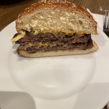 Rusty Bucket Restaurant and Tavern - This is half the Juicy Lucy burger with grilled onions and cheese. Great burger - American Near Me - Dublin, Ohio