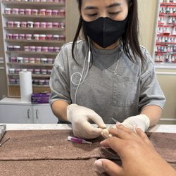 Julie doing my nails.