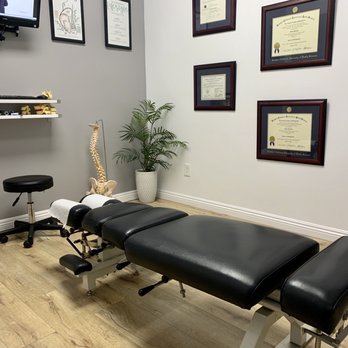 Reform Chiropractic - Downey - Watching informational video. - Chiropractors Near Me - Downey, California Reform Chiropractic - Downey - Watching informational video. - Chiropractors Near Me - Downey, California