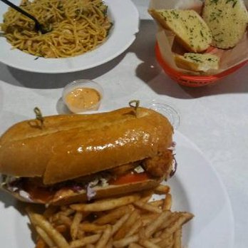 The Crab Shack - Shrimp Po'Boy w/Fries and Garlic Shrimp Noodles w/Garlic Bread-Yummy - Seafood Near Me - Long Beach, California The Crab Shack - Shrimp Po'Boy w/Fries and Garlic Shrimp Noodles w/Garlic Bread-Yummy - Seafood Near Me - Long Beach, California