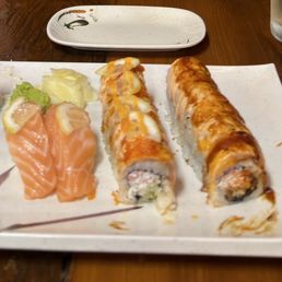 (In order from left to right) Golden Dragon Roll Lemon Salmon nigiri  Dynamite roll (added lemon on top) Lion king roll