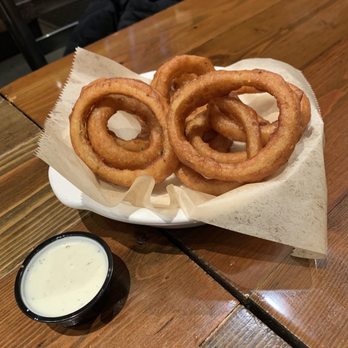 Tapped - Taphouse & Kitchen - Onion rings after we ate a few. They are sooo good! - Gastropubs Near Me - Moscow, Idaho Tapped - Taphouse & Kitchen - Onion rings after we ate a few. They are sooo good! - Gastropubs Near Me - Moscow, Idaho