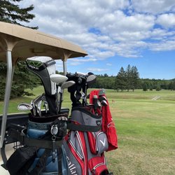 Bracebridge Golf Club - Golf clubs in front of hole 1