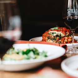 Salad and lasagna at Strada