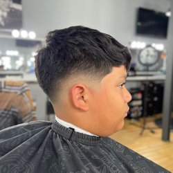 Whiskey and Razorblades - Textured messy top with Low Drop fade by @jujuxthebarber booking link in IG bio