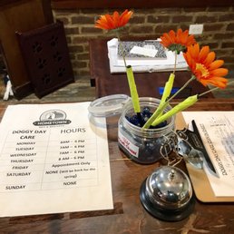 The front desk with hours for Doggie Day Care! The front desk with hours for Doggie Day Care!