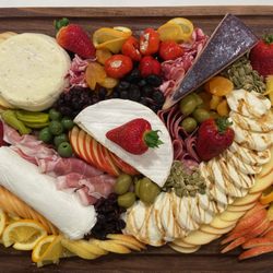 MadeByRK - Cheeseboard with charcuterie and fresh fruit.