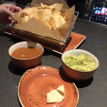 Discovery Lounge - a bowl of guacamole, tortillas, and a basket of chips - Desserts Near Me - Carefree, Arizona Discovery Lounge - a bowl of guacamole, tortillas, and a basket of chips - Desserts Near Me - Carefree, Arizona