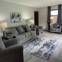 Ephraim Village Cottages - A living room should have a place for every family member to sit comfortably. All our cottages have a recliner OR a chair with ottoman.