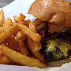 Photo of Burgess Brothers BBQ & Burgers - Sacramento, CA, United States. Loaded smoked burger with well done fries