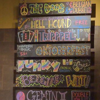 Mackenzie Brewing - a chalk board with a bunch of different signs on it - Breweries Near Me - Valley Park, Missouri