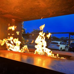 Outdoor seating area by firepit Outdoor seating area by firepit