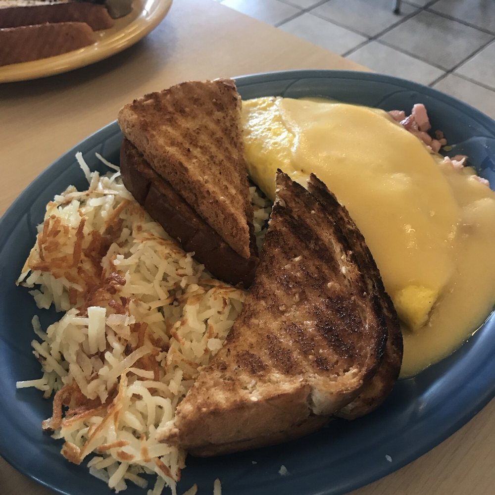 Drifter's Restaurant - Meat lovers omelet with hollandaise added. Hash Browns and fresh baked wheat toast - American Near Me - Escanaba, Michigan Drifter's Restaurant - Meat lovers omelet with hollandaise added. Hash Browns and fresh baked wheat toast - American Near Me - Escanaba, Michigan