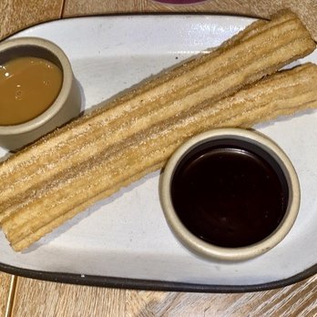 Maximón - Churros with caramel and chocolate sauce - Latin American Near Me - Baltimore, Maryland Maximón - Churros with caramel and chocolate sauce - Latin American Near Me - Baltimore, Maryland