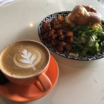Roast & Brew - Latte and croissant sandwich - Coffee & Tea Near Me - Houston, Texas Roast & Brew - Latte and croissant sandwich - Coffee & Tea Near Me - Houston, Texas