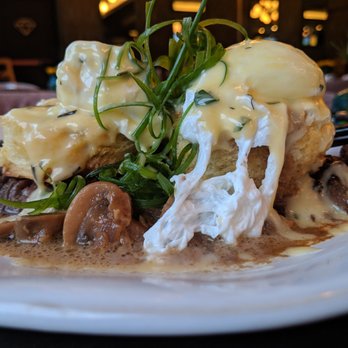 Jim Brady's - Challah toast on hanger steak, topped with poached eggs and Bearnaise sauce. - American Near Me - Royal Oak, Michigan Jim Brady's - Challah toast on hanger steak, topped with poached eggs and Bearnaise sauce. - American Near Me - Royal Oak, Michigan