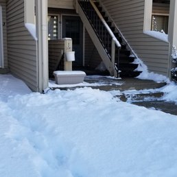 The left sidewalk is what a shoveled sidewalk looks like to ACCU Inc.