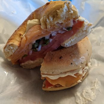 Rich's Bagels - Lox Sandwich on an Onion Dill Bagel with Cream Cheese, Capers, sliced Red Onion, sliced Tomatoes, and Lox - Bagels Near Me - Holladay, Utah Rich's Bagels - Lox Sandwich on an Onion Dill Bagel with Cream Cheese, Capers, sliced Red Onion, sliced Tomatoes, and Lox - Bagels Near Me - Holladay, Utah