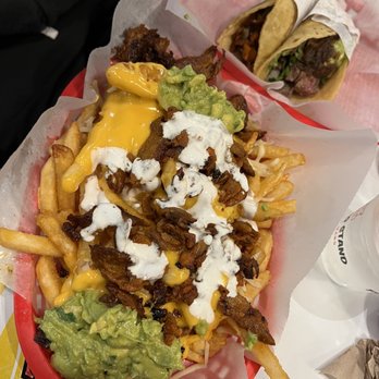 The Taco Stand - Al Pastor and Carne Asada Tacos (Top) & Al Pastor Fries (Bottom) - Mexican Near Me - Costa Mesa, California The Taco Stand - Al Pastor and Carne Asada Tacos (Top) & Al Pastor Fries (Bottom) - Mexican Near Me - Costa Mesa, California