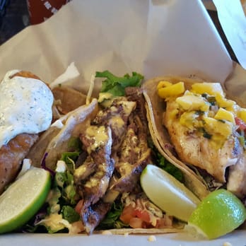 Fish District - From left to right: Fish battered taco, steak taco, and grilled Mahi Mahi taco. Soooooooooo good...and big. - Seafood Near Me - Carlsbad, California Fish District - From left to right: Fish battered taco, steak taco, and grilled Mahi Mahi taco. Soooooooooo good...and big. - Seafood Near Me - Carlsbad, California