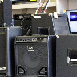 Champion Pawn and Jewelry - Amps, mixing boards, mics, and other accessories.