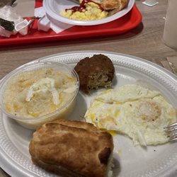 Mamie’s Kitchen Biscuits - Salmon croquette, sunny side up eggs, grits with cheese, and a biscuit