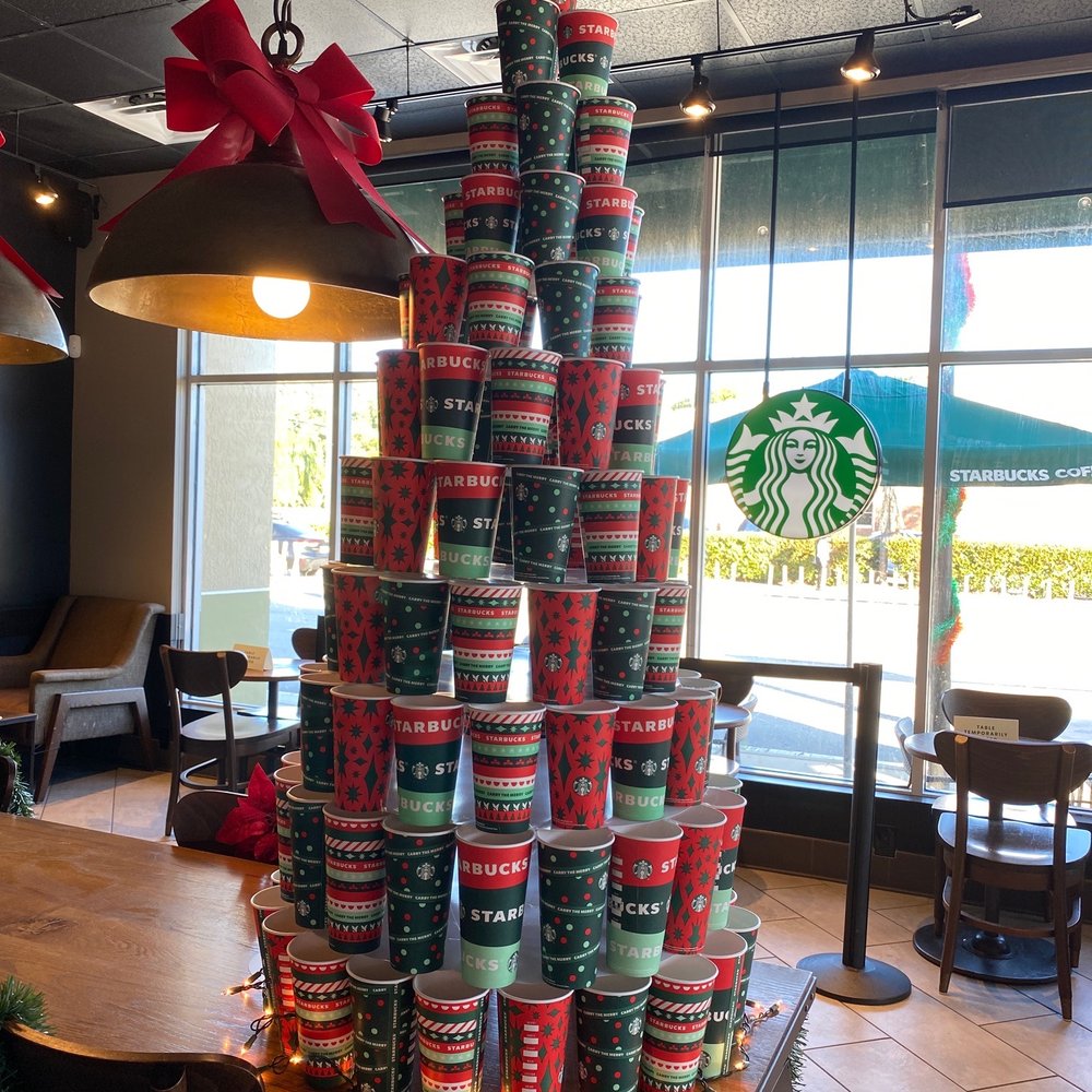 a christmas tree made out of coffee cups a christmas tree made out of coffee cups