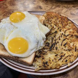 Scrapple and eggs...and some killer hash browns. Apparently they're famous for them. Scrapple and eggs...and some killer hash browns. Apparently they're famous for them.