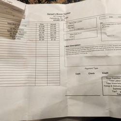 Picture of Hensel's Mower Service repair invoice.