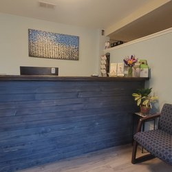 Axis Chiropractic - Our new front desk reception area is looking good!