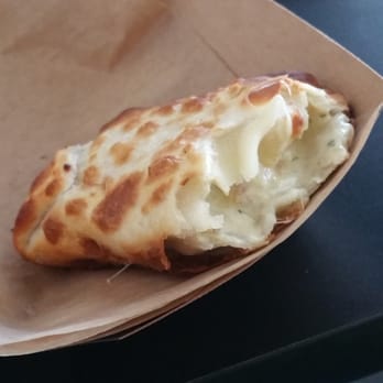 Macondo Coffee Roasters - The caprese empanada with lots of cheese and tomatoes - Coffee & Tea Near Me - Doral, Florida Macondo Coffee Roasters - The caprese empanada with lots of cheese and tomatoes - Coffee & Tea Near Me - Doral, Florida