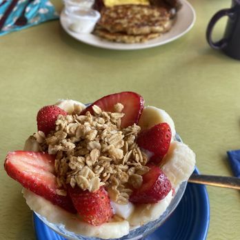 Mary's Morning Mix Up - Parfait with fruit yogurt and granola. Breakfast plate with eggs, sausage, bacon, and potato pancakes. - Breakfast & Brunch Near Me - Brookfield, Illinois