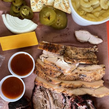 Old Bucs Barbecue - a variety of food items - Barbeque Near Me - Manvel, Texas