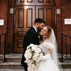 The Fresh Blossom Wedding and Event Florist - Over the top cascading bridal bouquet with orchids and roses. photo by William Avery Photography.