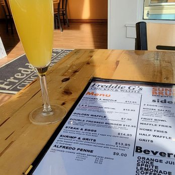 Freddie G's Chicken And Waffle - I love a mimosa on Sunday. - Waffles Near Me - St Louis, Missouri