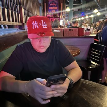 Bleacher Bar - Dare I wear a NY x LA hat to bleacher bat at Fenway lol - Sports Bars Near Me - Boston, Massachusetts