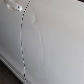 D & D Paintless Dent Repair - Before. Crease cause by a plastic tipped motorcycle handle bar that fell over in the garage. - Body Shops Near Me - Lancaster, California D & D Paintless Dent Repair - Before. Crease cause by a plastic tipped motorcycle handle bar that fell over in the garage. - Body Shops Near Me - Lancaster, California