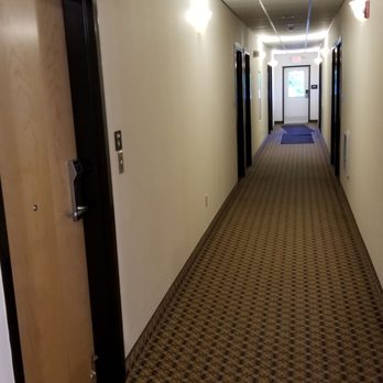 Rusty Cannon Motel - Hallways run off either side from reception. - Hotels Near Me - Westfield, Pennsylvania