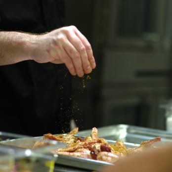 Pluck - a chef sprinkling seasoning on a dish - Food Trucks Near Me - Fremont, California Pluck - a chef sprinkling seasoning on a dish - Food Trucks Near Me - Fremont, California