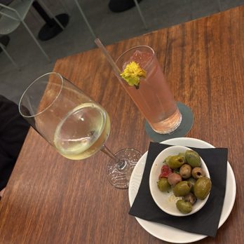 Lulla - Chardonnay and Pink Lemonade. Marinated olives. - Italian Near Me - New York, New York