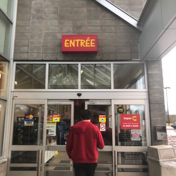 Super C - a person entering a store - Grocery Near Me - Blainville, Quebec Super C - a person entering a store - Grocery Near Me - Blainville, Quebec