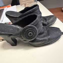 Mega Boot & Shoe Repair - Before picture. Very worn down.
