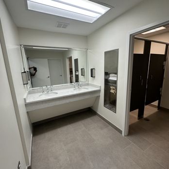 JBA Construction - a public restroom with two sinks - General Contractors Near Me JBA Construction - a public restroom with two sinks - General Contractors Near Me