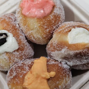 Passion Bakery Cafe - Cookies-n-cream, POG, vanilla bean, and mango malasadas. - Bakeries Near Me - Kapaa, Hawaii Passion Bakery Cafe - Cookies-n-cream, POG, vanilla bean, and mango malasadas. - Bakeries Near Me - Kapaa, Hawaii